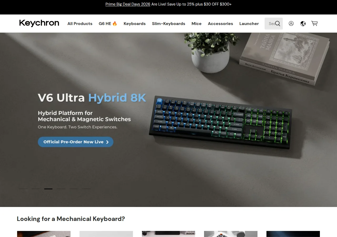 Screenshot of the Keychron home page showing a V6 Ultra Hybrid 8K keyboard banner and a notice that shipping resumes on Oct 7
