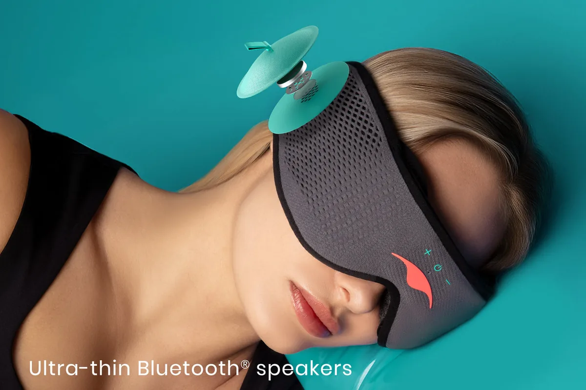 Woman wearing the Manta SOUND sleep mask with built-in speakers